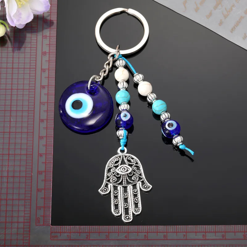 Devil'S Eye Palm Alloy Glass Plating Bag Keychain image 1