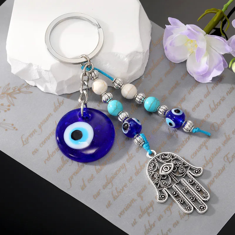Devil'S Eye Palm Alloy Glass Plating Bag Keychain image 0